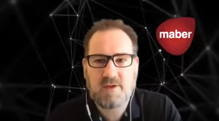 Ian Harris with a black background and a white Maber logo that is surrounded by a red circle.