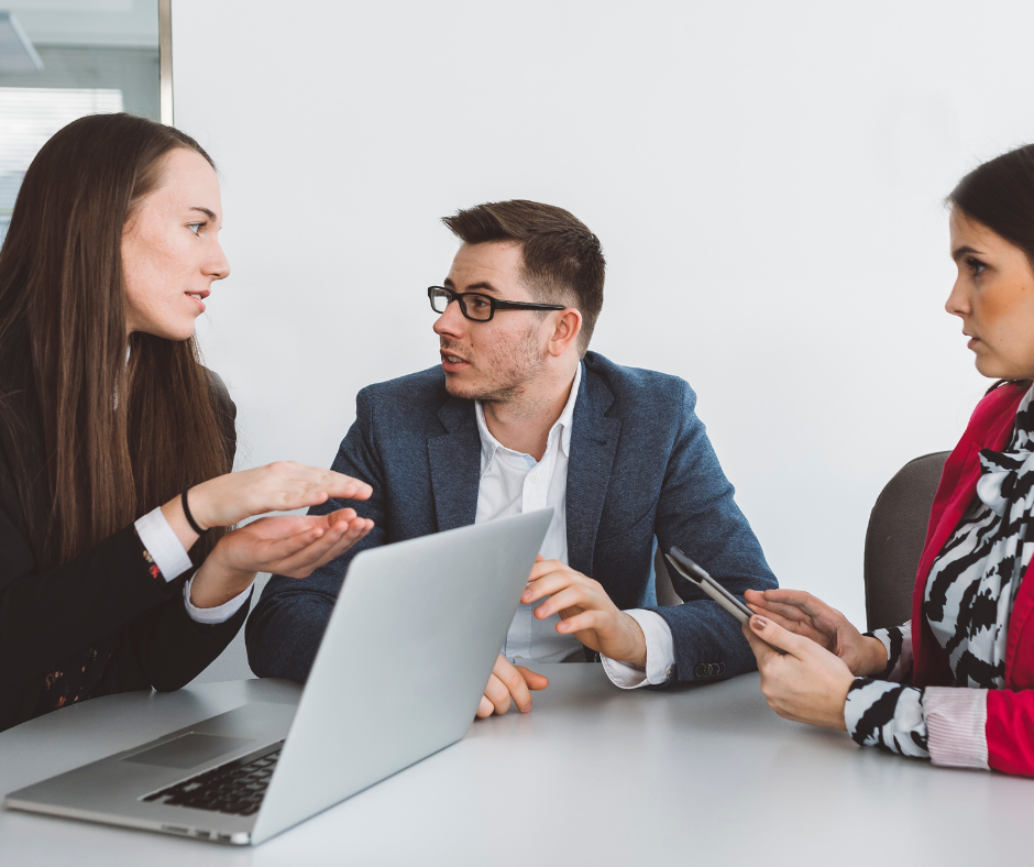 Professional conversation with differing opinions, illustrating how conflict can be positive for collaboration and better decision-making.